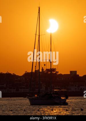 Sunset at Socoa during the Solar Eclipse taken from the beach at Saint Jean de `Luz Stock Photo